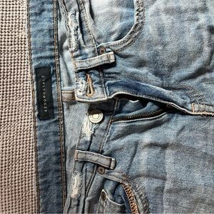 Distressed boyfriend jeans